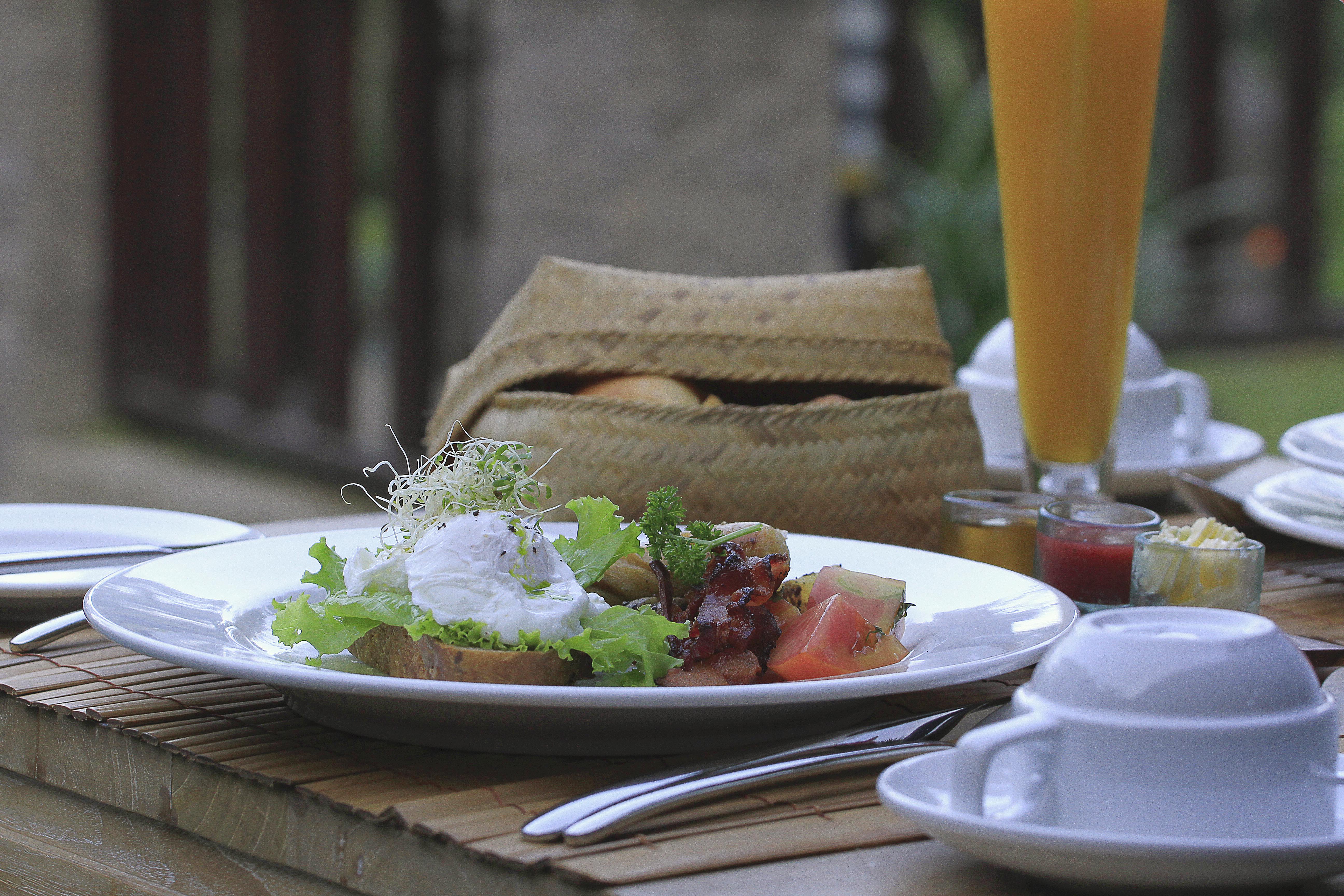 Pramana Watu Kurung Hotel Ubud  Exterior photo A breakfast at the hotel
