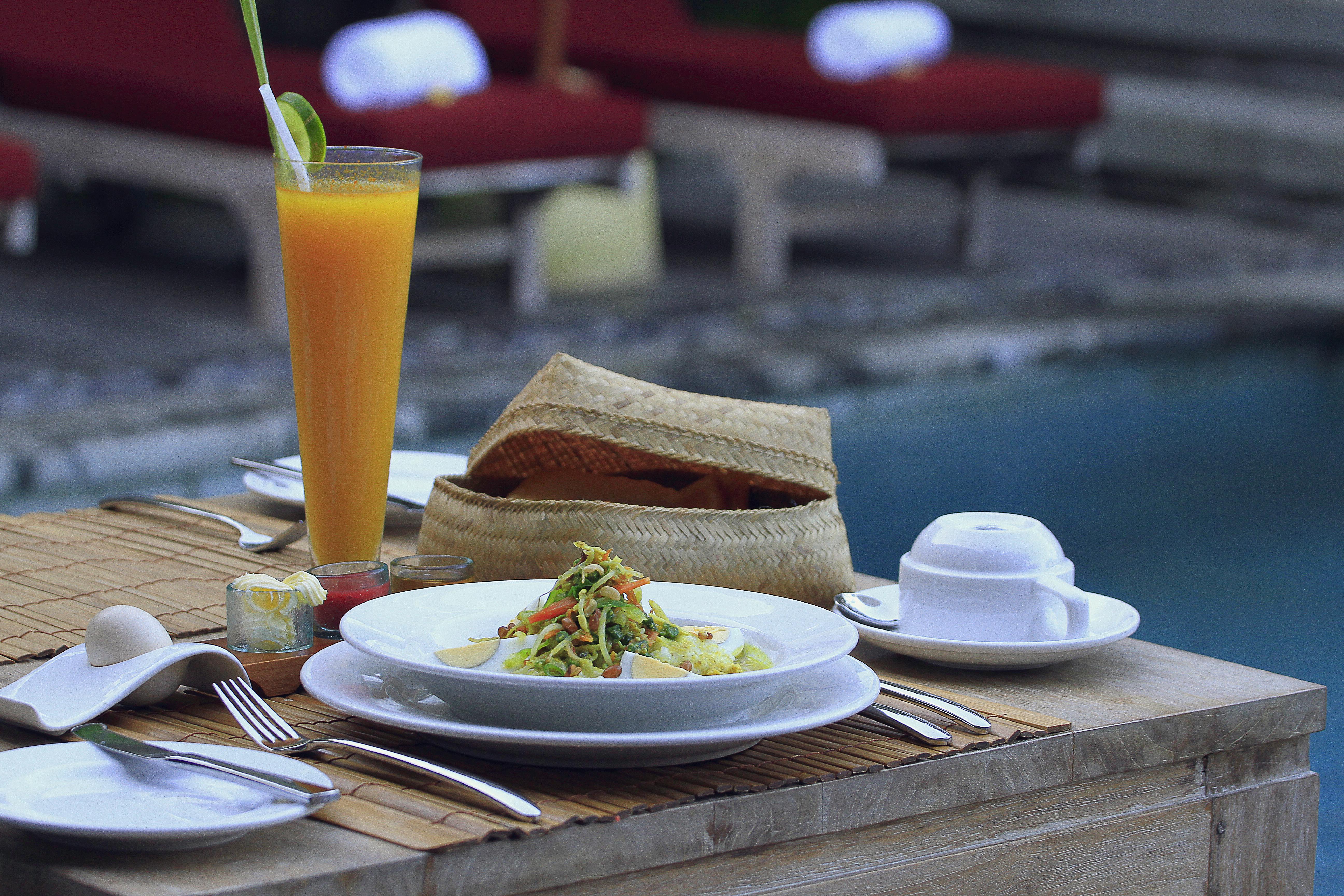 Pramana Watu Kurung Hotel Ubud  Exterior photo A meal at a hotel