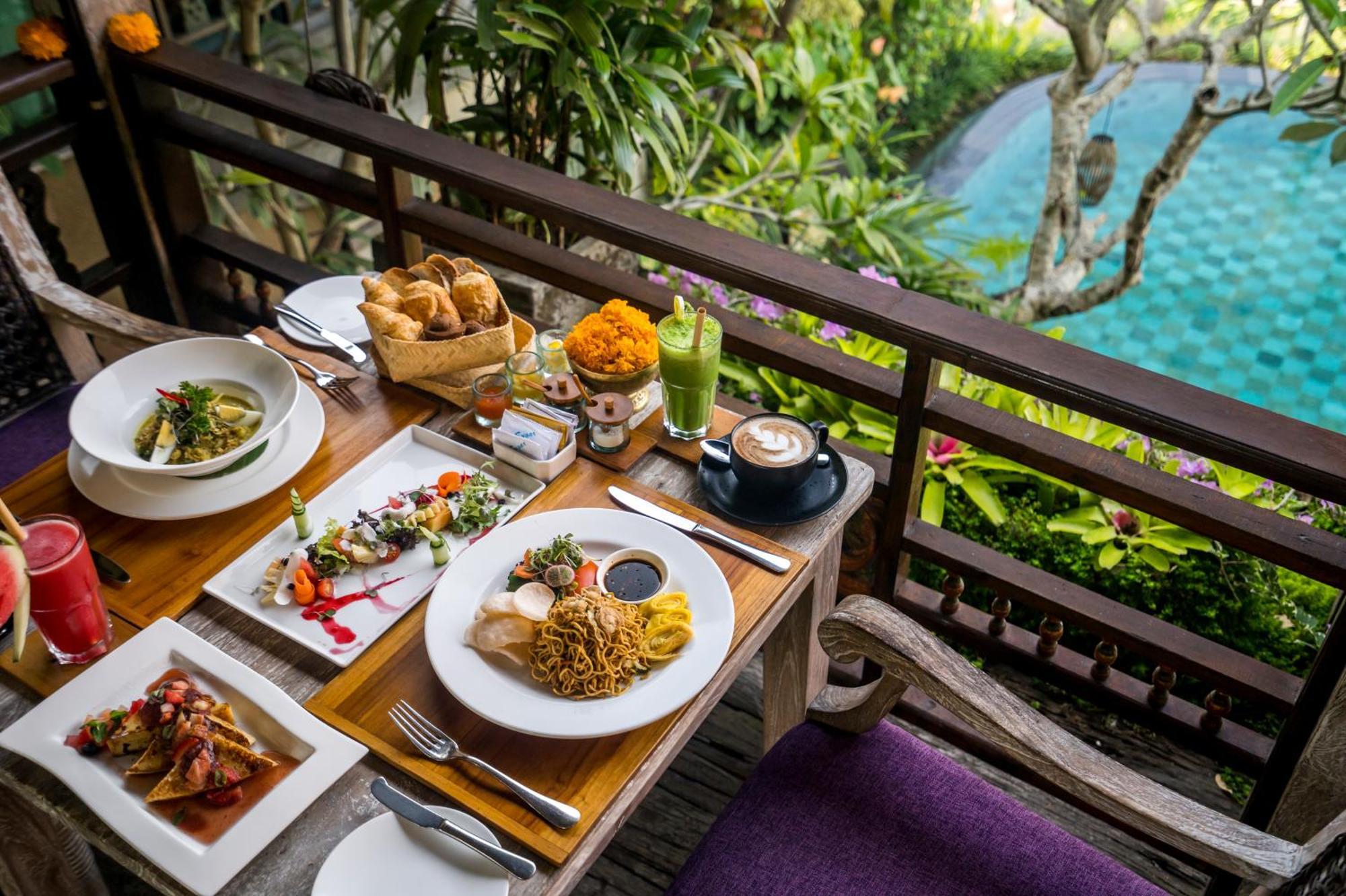 Pramana Watu Kurung Hotel Ubud  Exterior photo A selection of dishes at the restaurant